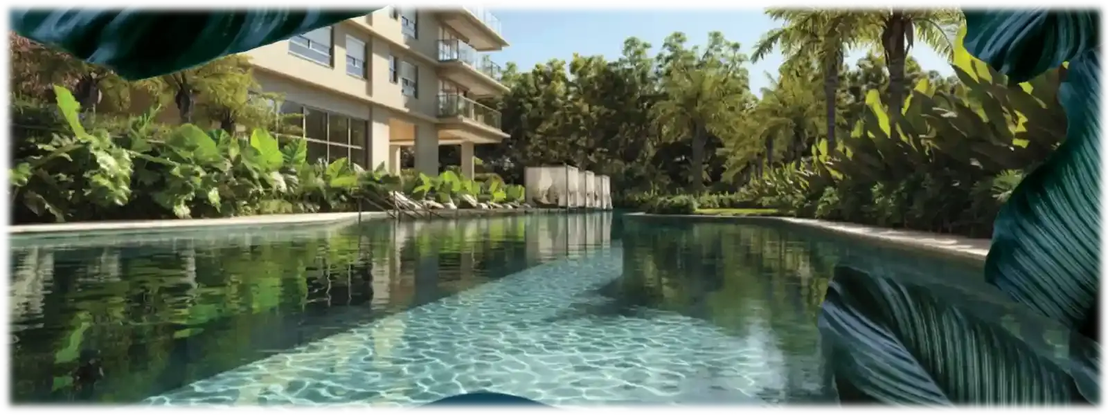Piscina do KA'A Home Boutique cercada pelo paisagismo